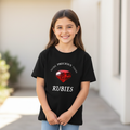 Happy kid wearing More Precious than Rubies t-shirt with larger fit