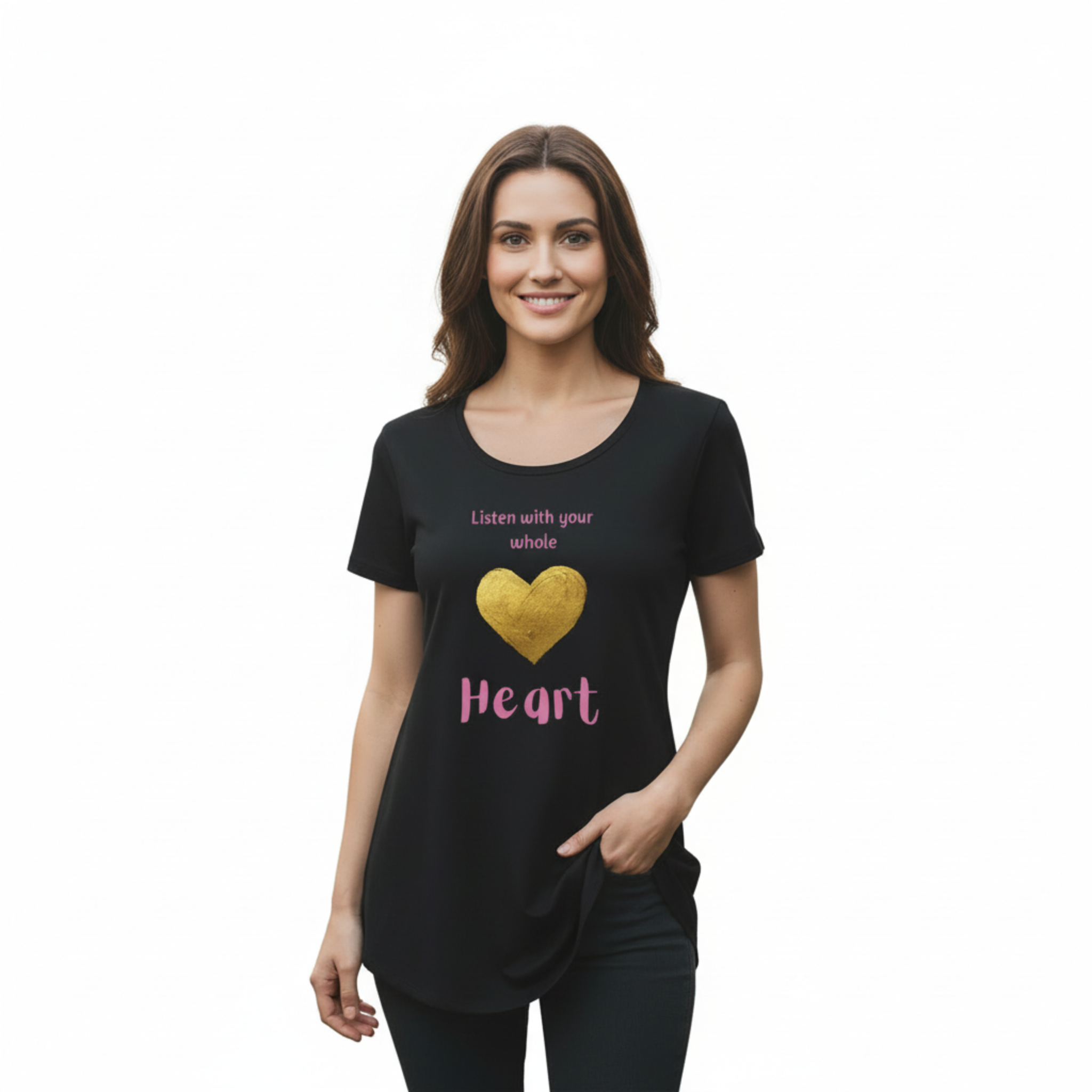 Woman in casual pose wearing Listen with your whole heart t-shirt on white background