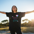 Woman in relaxed boyfriend tee with design clearly visible