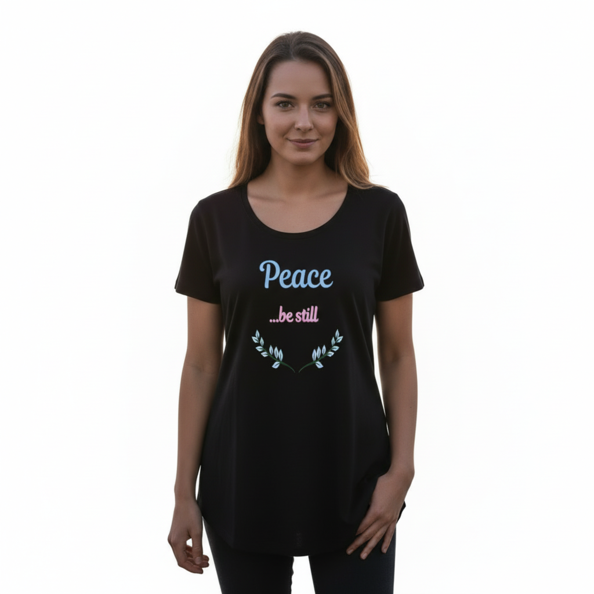 Woman in relaxed pose wearing Peace be still t-shirt with full head visible