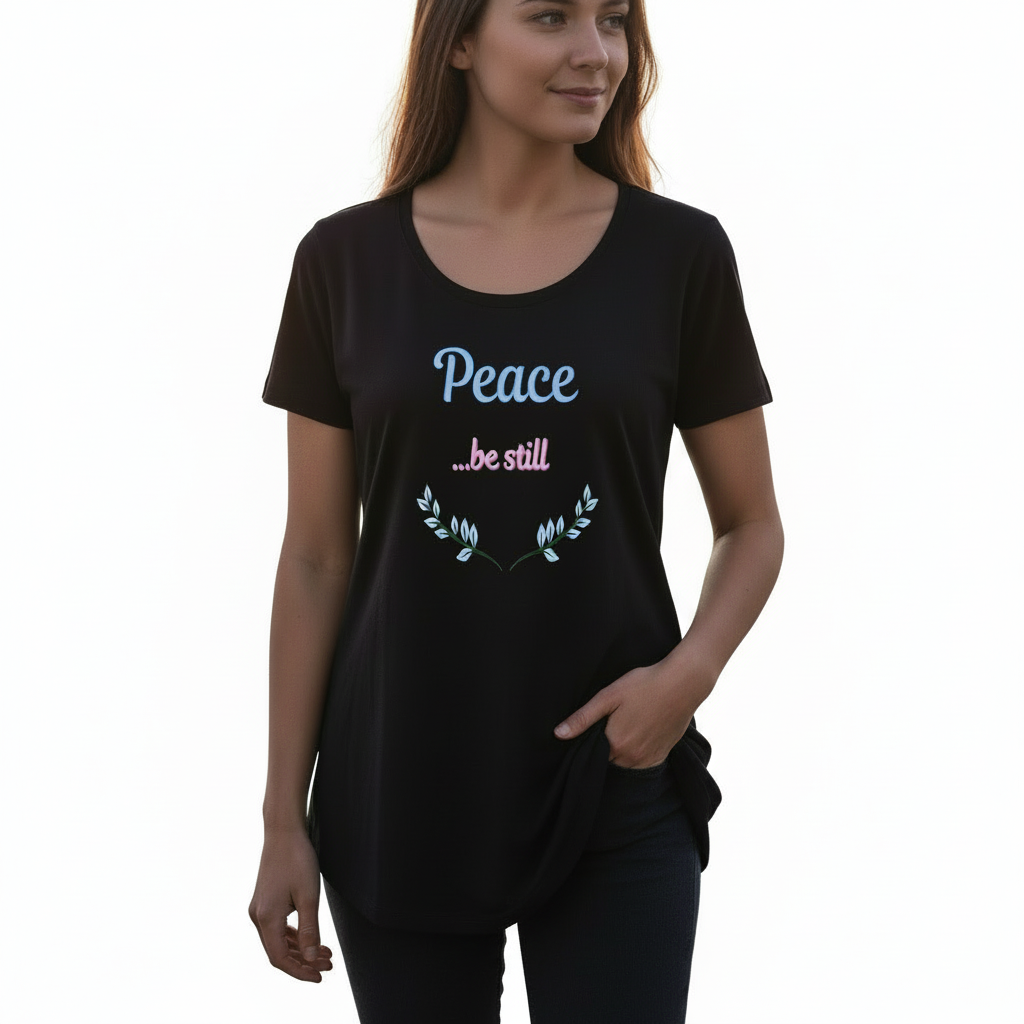 Woman in relaxed pose wearing Peace be still t-shirt