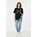 Woman wearing oversized Choose Freedom tee